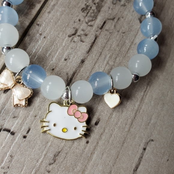 NWT Sanrio Hello Kitty Beaded Cartoon Bracelet Stretchy Blue Gray White - Picture 4 of 11